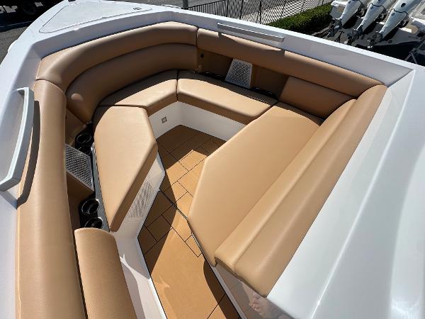 Slide: The Image of 2024 Aviara AV36 boat with tan leather seating in the bow area. - 9