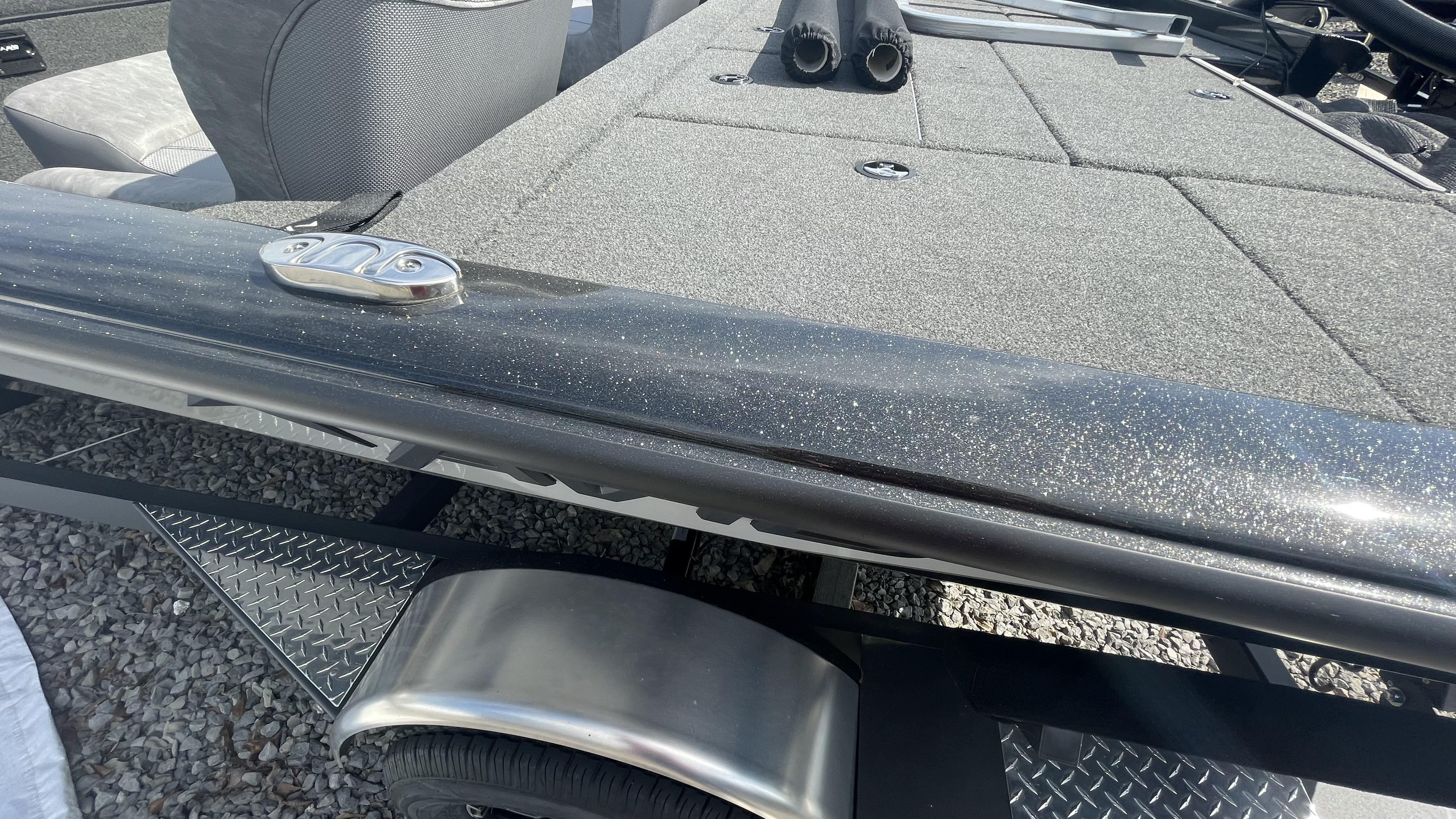 Slide: The Image of 2023 Avid 19XB boat with metallic finish and trailer. - 10