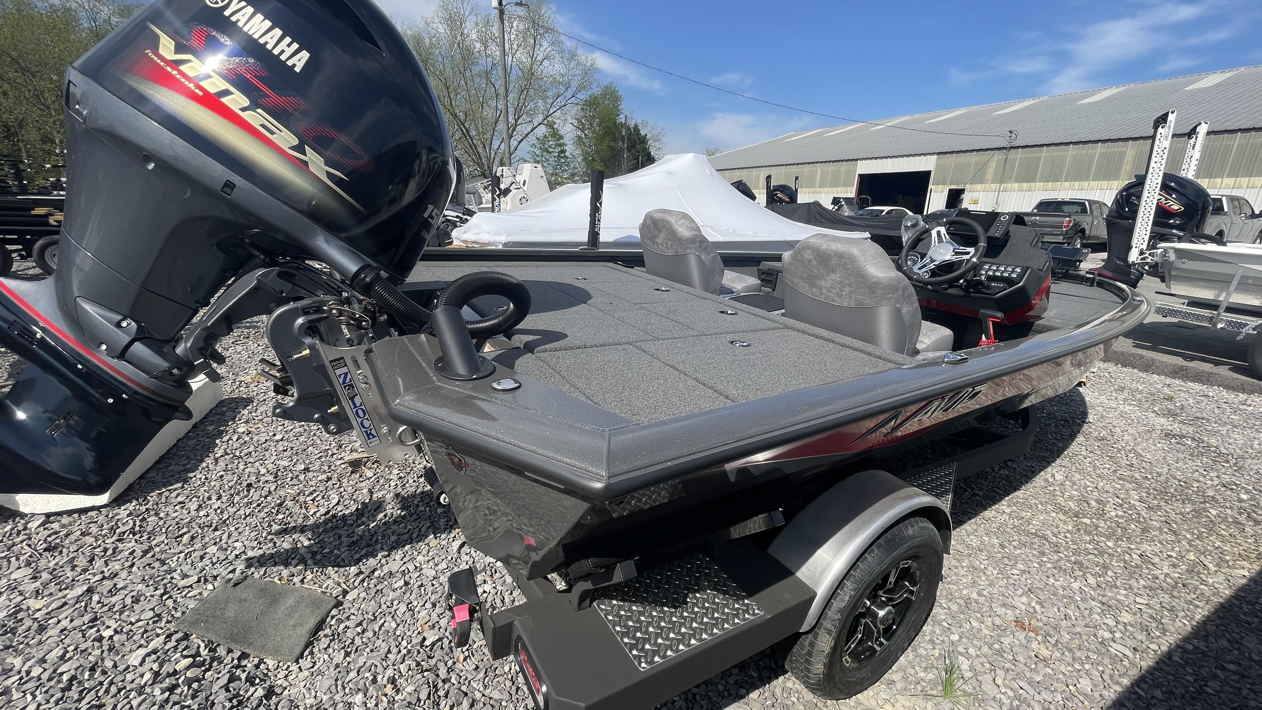 Slide: The Image of 2023 Avid 19XB boat with Yamaha VMAX engine on trailer. - 10