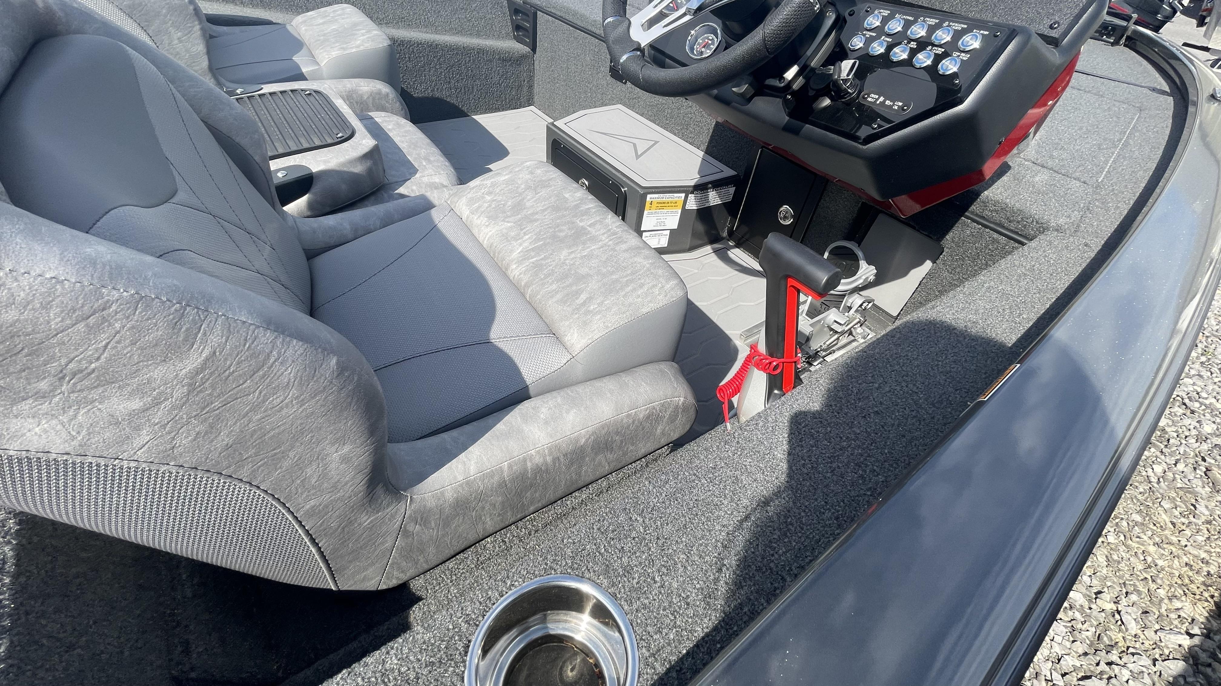 Slide: The Image of Interior of 2023 Avid 19XB boat with gray seats and control panel. - 14