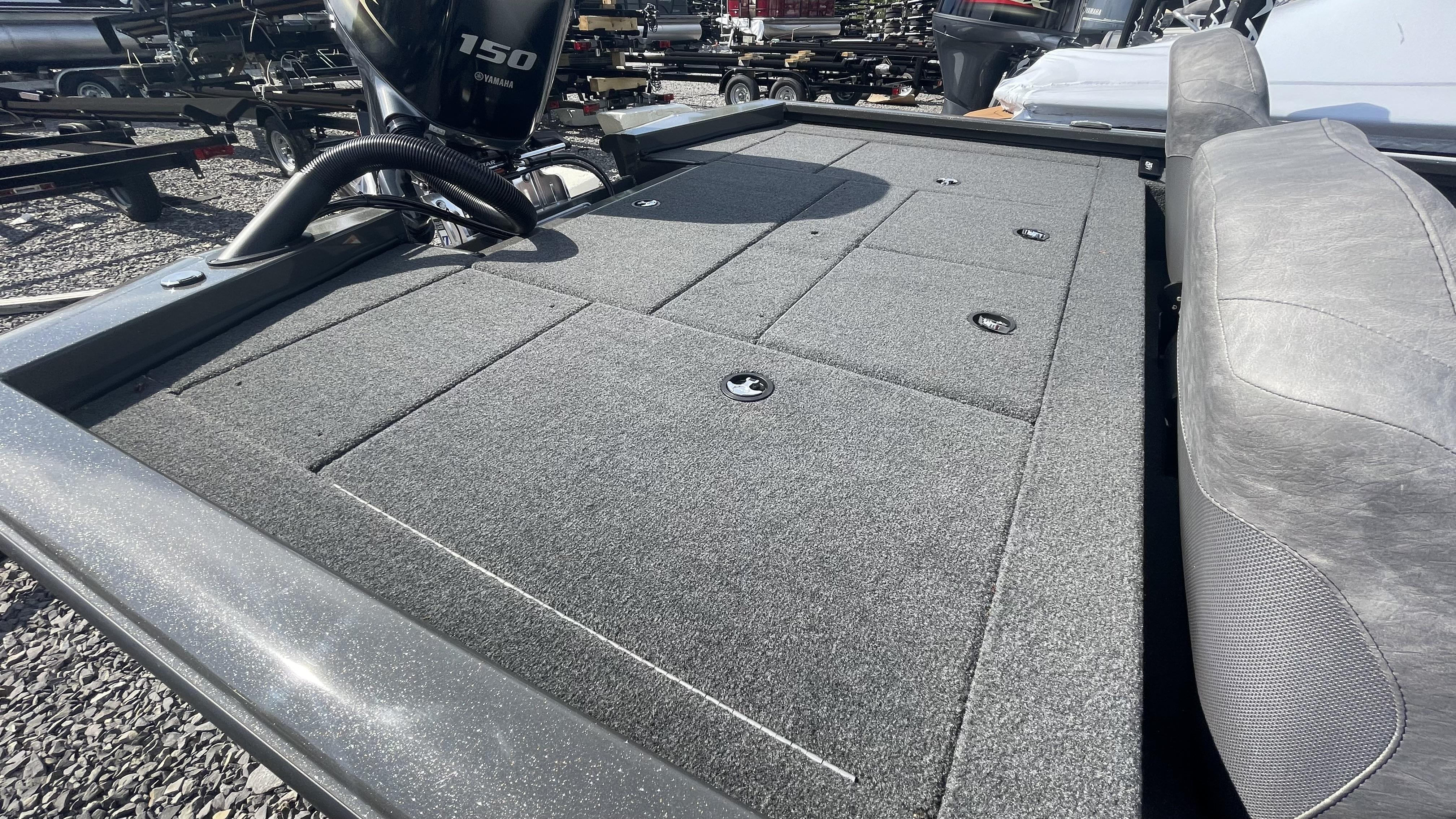 Slide: The Image of 2023 Avid 19XB boat with Yamaha 150 engine, rear deck view. - 15