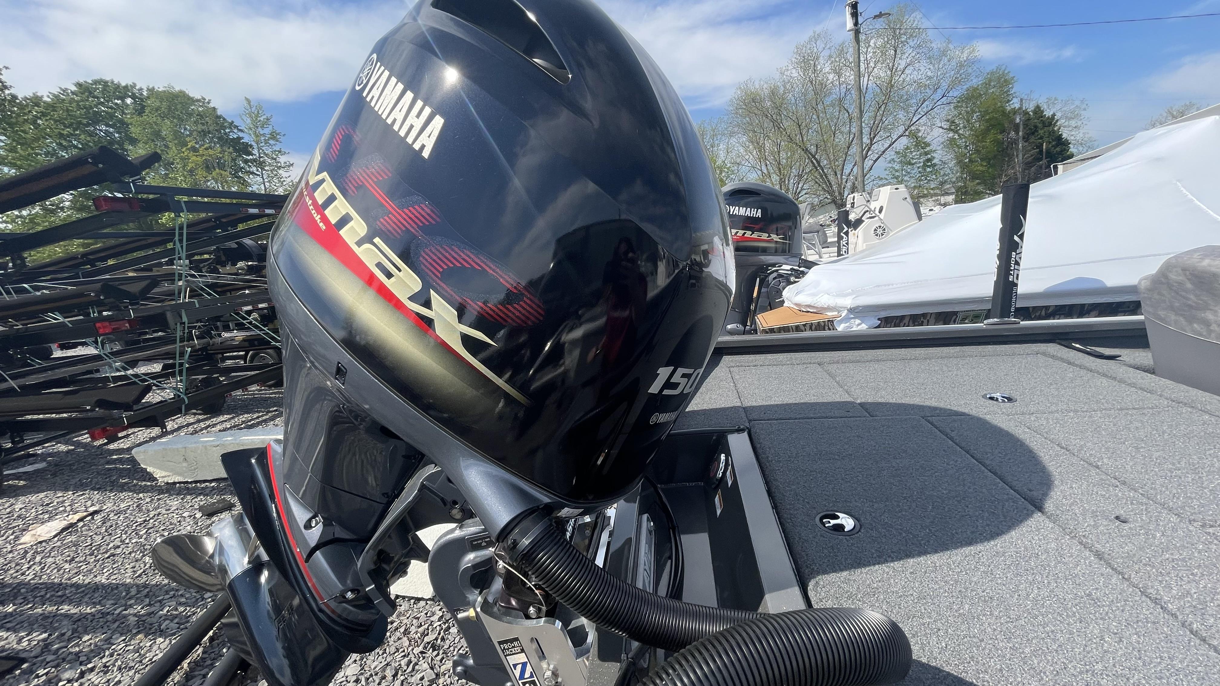 Slide: The Image of 2023 Avid 19XB boat with Yamaha 150 VMAX outboard motor. - 16