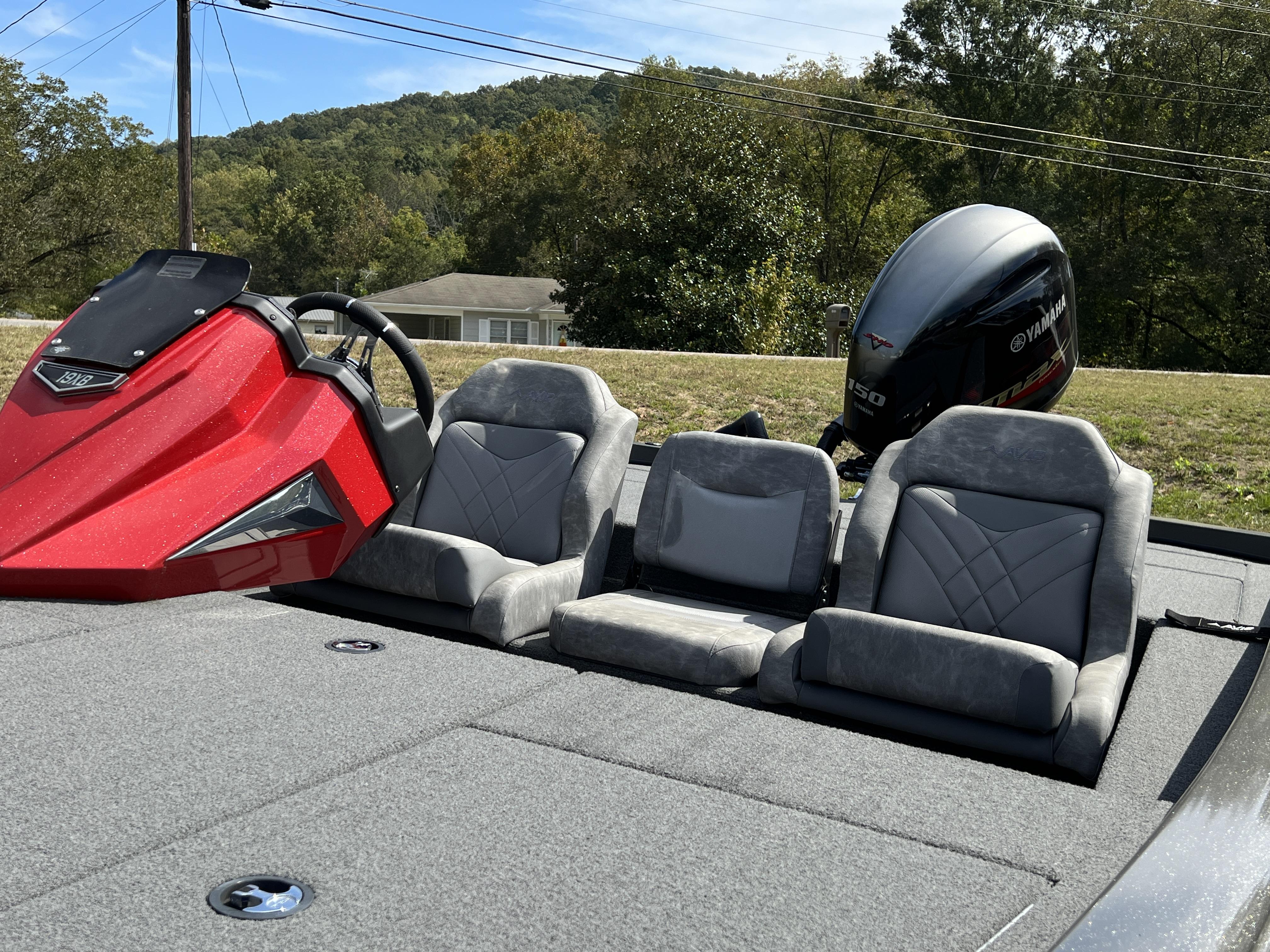 Slide: The Image of 2023 Avid 19XB boat with Yamaha outboard motor, red console, and gray seating. - 20