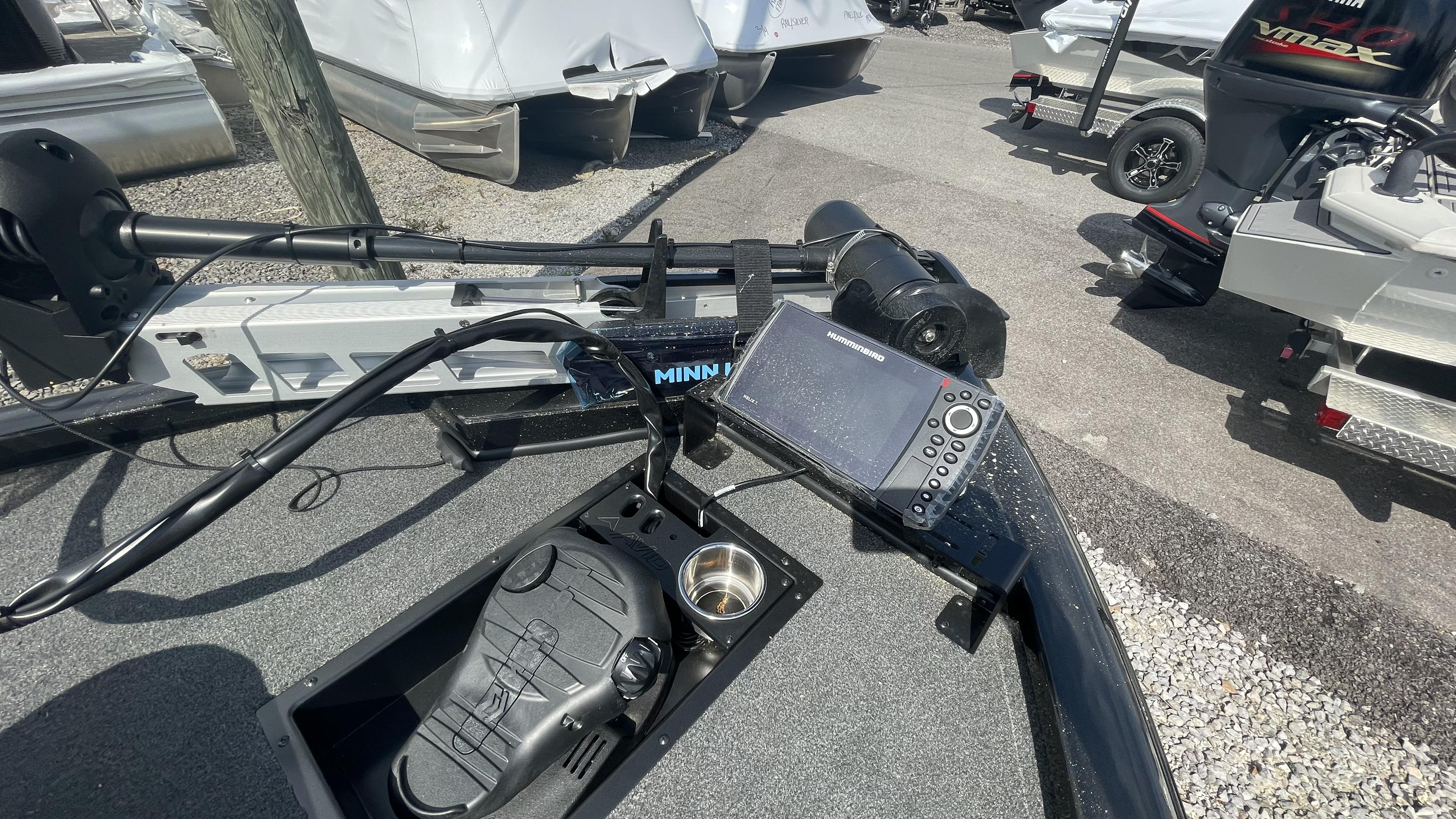 Slide: The Image of 2023 Avid 19XB boat with Minn Kota trolling motor and Humminbird fish finder. - 4