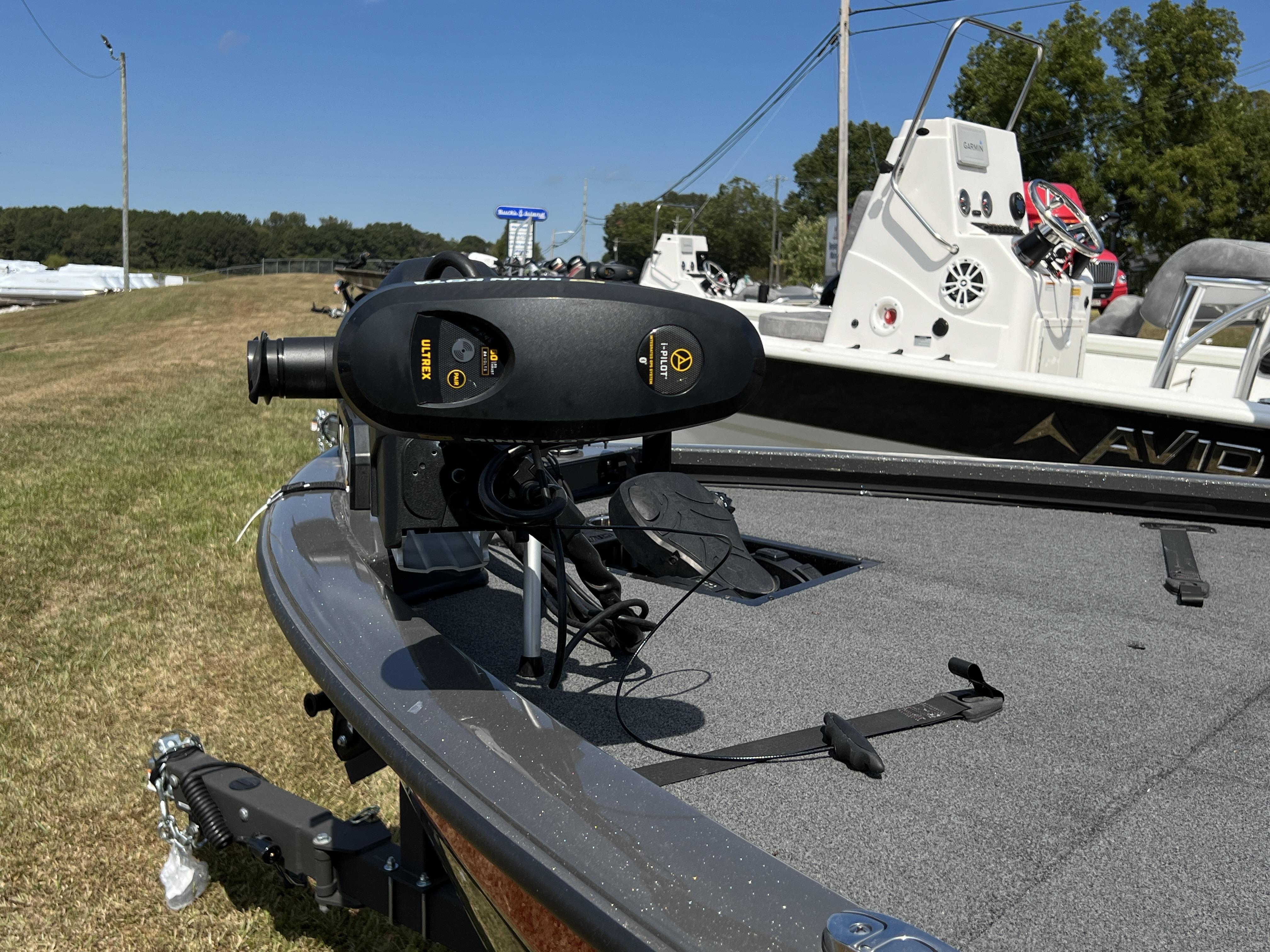 Slide: The Image of 2023 Avid 19XB boat with Minn Kota Ultrex trolling motor. - 7