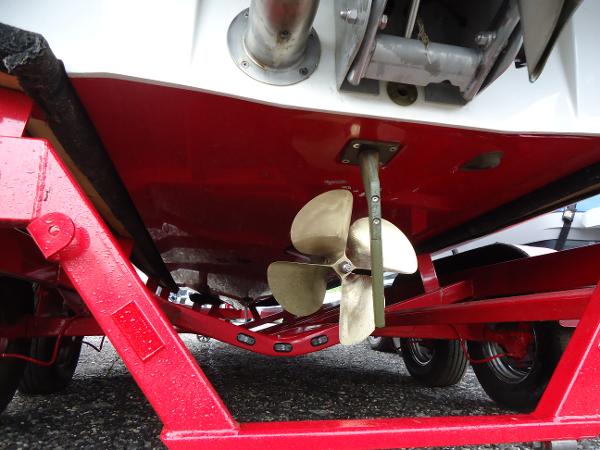 Slide: The Image of 2021 Axis A20 boat propeller and red trailer close-up. - 13