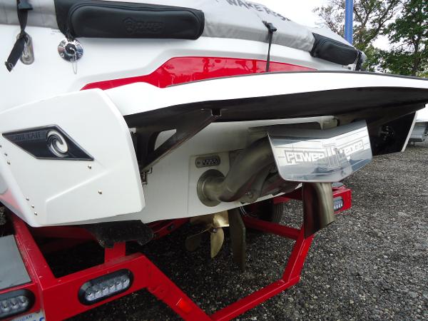Slide: The Image of 2021 Axis A20 boat rear view showing propeller and exhaust system. - 14