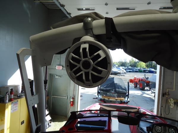 Slide: The Image of 2021 Axis A20 boat with tower speaker in a garage. - 4