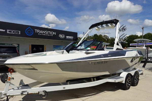 Slide: The Image of 2020 Axis T22 boat on trailer at Transition Watersports dealership. - 1