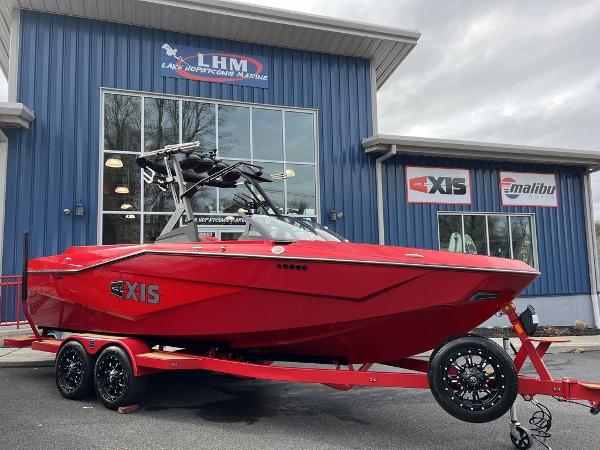 Slide: The Image of 2024 Axis T235 red boat on trailer at Lake Hopatcong Marine. - 1