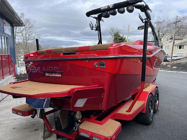 Slide: The Image of 2024 Axis T235 red boat on trailer, rear view. - 3