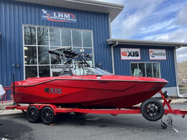 Slide: The Image of 2024 Axis T235 boat on trailer at Lake Hopatcong Marine dealership. - 4
