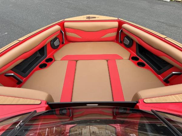 Slide: The Image of 2024 Axis T235 boat interior with red and tan seating. - 5