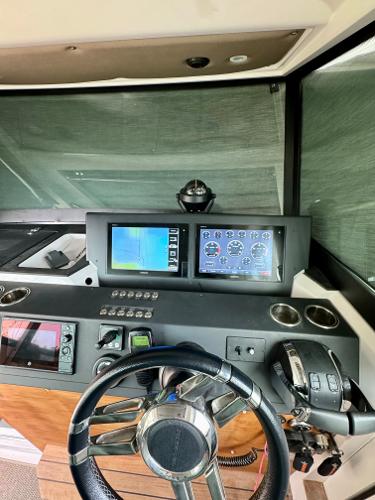 Slide: The Image of Axopar 37XC CROSS CABIN 2018 helm with modern navigation and control systems. - 19