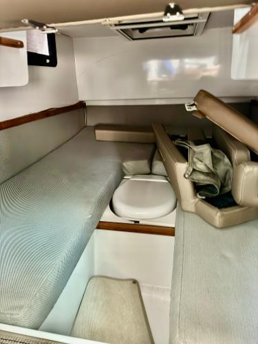 Slide: The Image of Interior cabin of 2018 Axopar 37XC CROSS CABIN with seating and storage. - 27