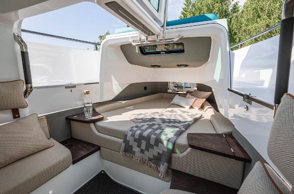 Slide: The Image of Luxurious interior of 2024 Axopar 37 XC Cross Cabin with cozy bed and modern design. - 14