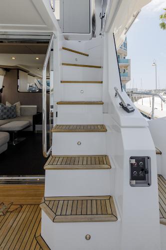 Slide: The Image of Staircase on 2021 Azimut 60 Flybridge yacht, leading to upper deck. - 21