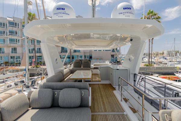 Slide: The Image of Luxurious 2021 Azimut 60 Flybridge yacht with spacious seating and modern amenities. - 22