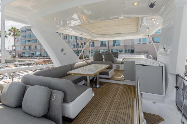 Slide: The Image of Luxurious 2021 Azimut 60 Flybridge yacht with elegant seating and modern design. - 24