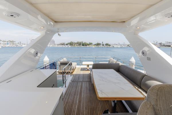 Slide: The Image of Azimut 60 Flybridge 2021 yacht interior with elegant seating and ocean view. - 30
