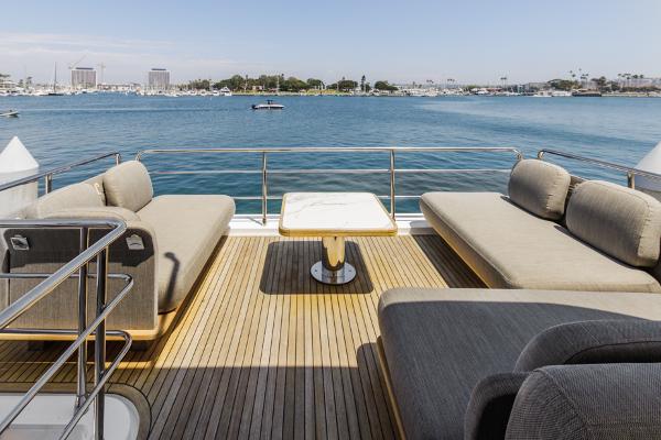 Slide: The Image of Azimut 60 Flybridge 2021 yacht deck with luxurious seating and ocean view. - 31