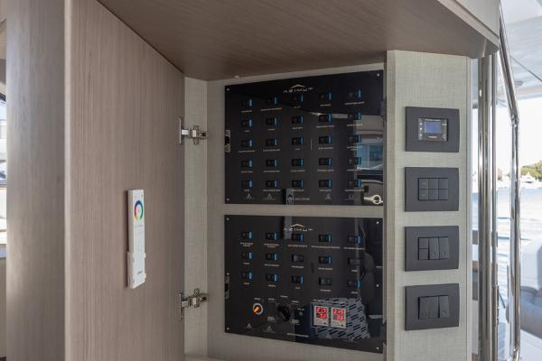 Slide: The Image of Azimut 60 Flybridge 2021 yacht control panel with modern switches and displays. - 45