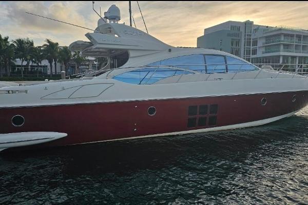 Slide: The Image of 2009 Azimut 68S yacht docked at marina during sunset. - 1