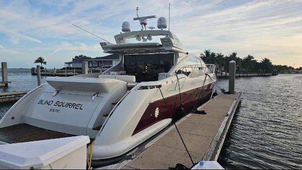 Slide: The Image of 2009 Azimut 68S yacht docked at marina during sunset. - 3