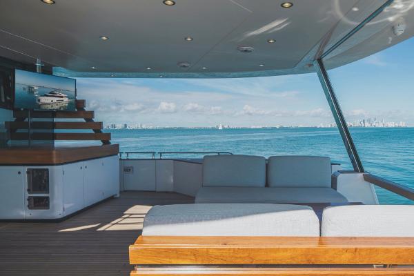 Slide: The Image of Azimut Magellano 25 Metri 2023 yacht deck with ocean view and modern seating. - 15