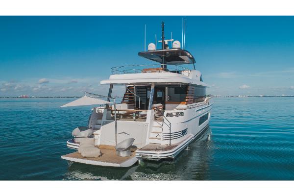 Slide: The Image of 2023 Azimut Magellano 25 Metri yacht on calm waters, rear view. - 8