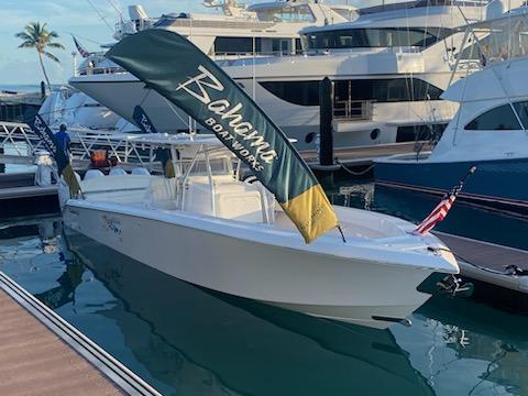 Slide: The Image of 2024 Bahama 41' Open Fisherman boat docked at marina. - 3