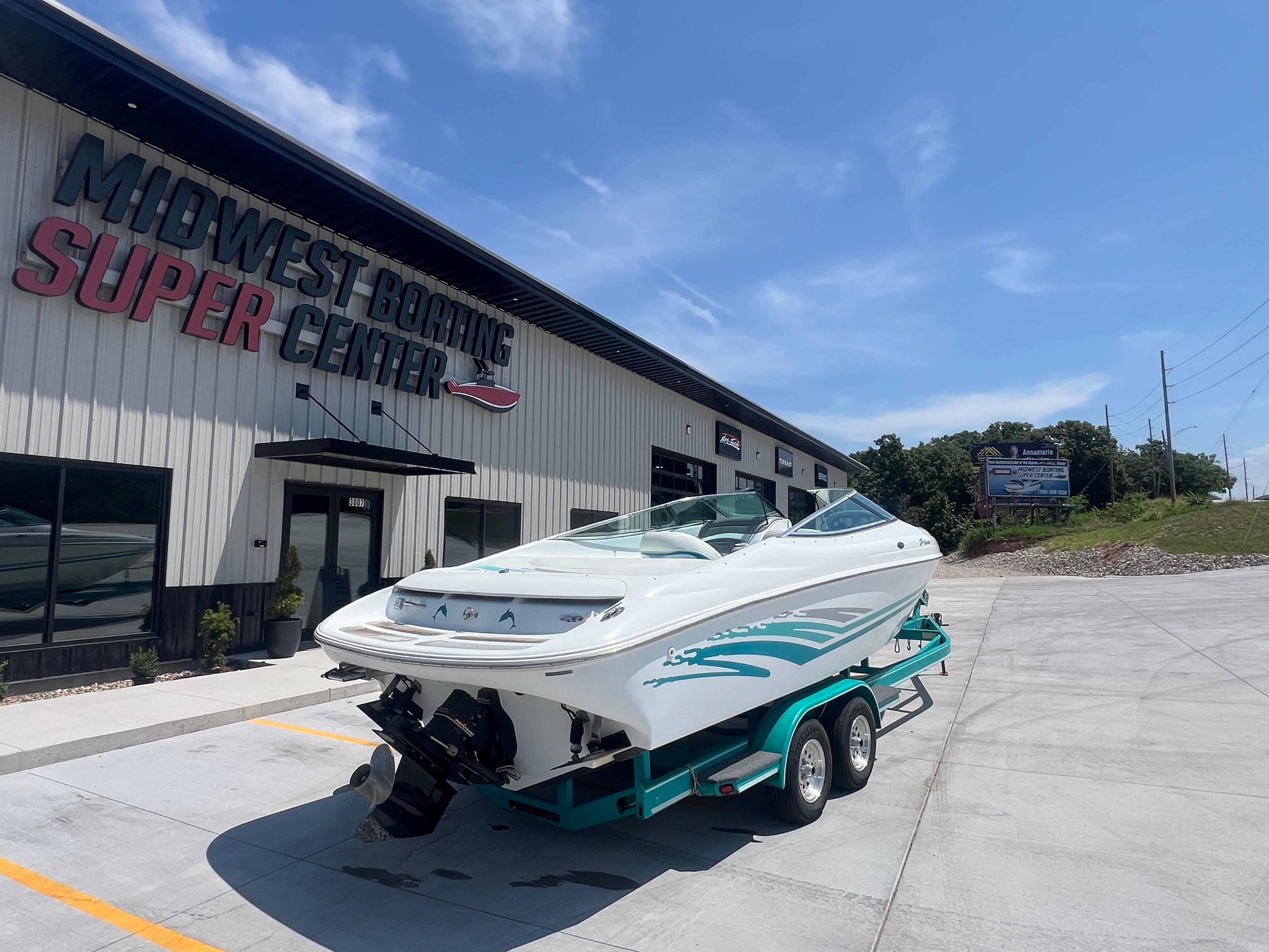 Slide: The Image of 1999 Baja 272 Islander boat on trailer at Midwest Boating Super Center. - 1