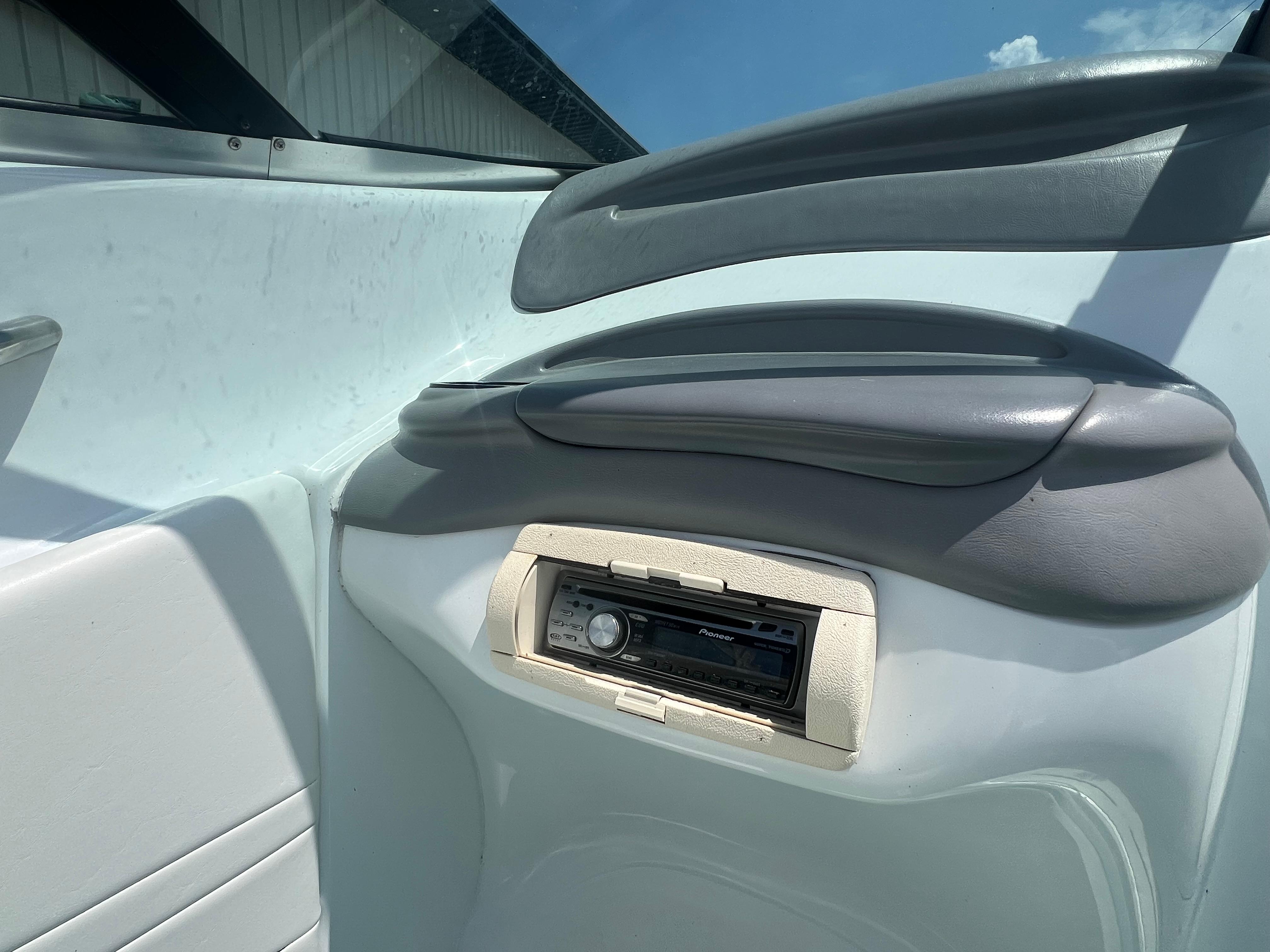 Slide: The Image of Interior of 1999 Baja 272 Islander boat with stereo system. - 10