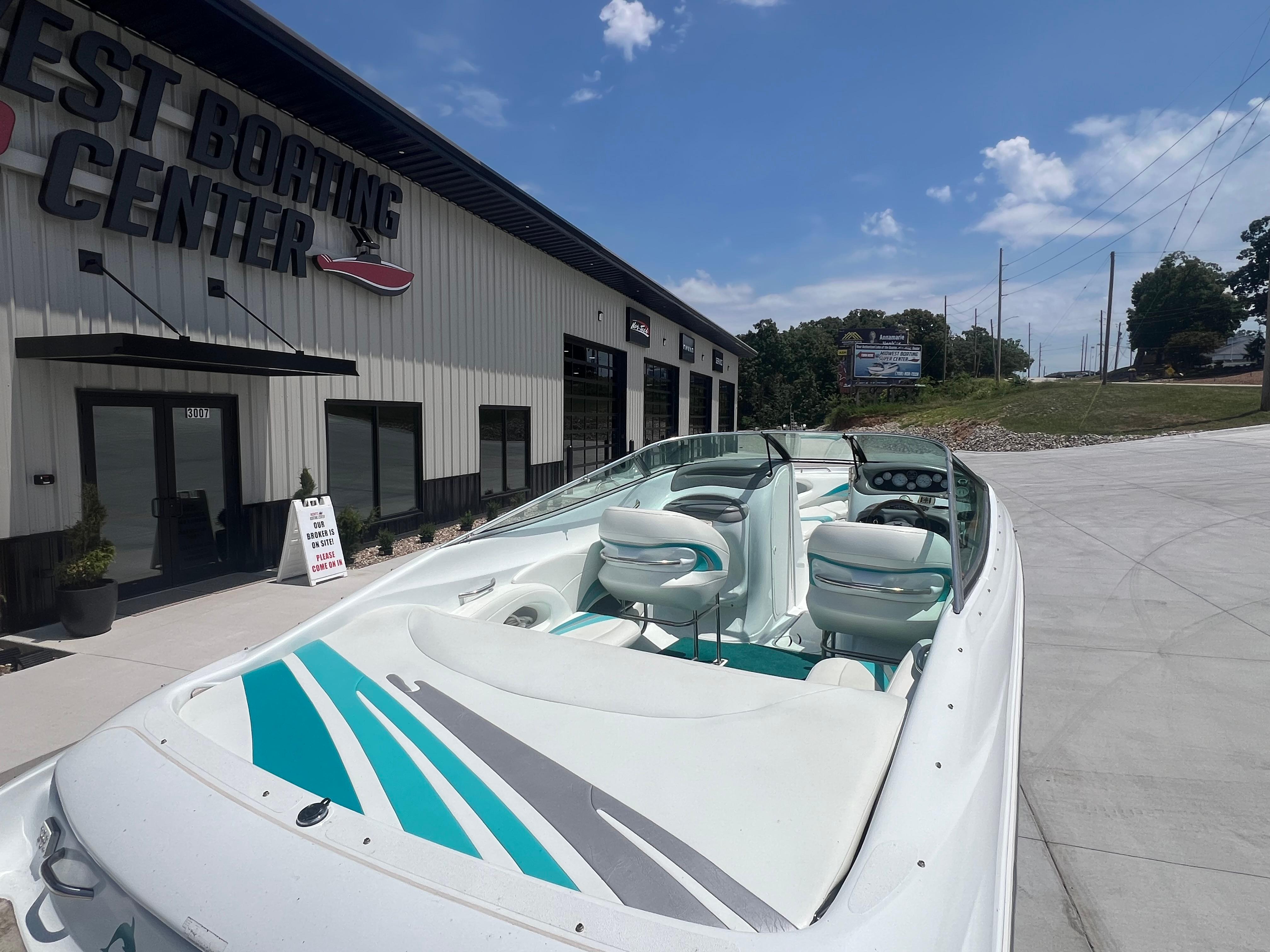 Slide: The Image of 1999 Baja 272 Islander boat at West Boating Center, sunny day, clear sky. - 7