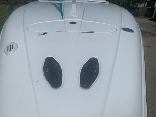 Slide: The Image of 1999 Baja 29 Outlaw SST boat deck with hatches and vents. - 34