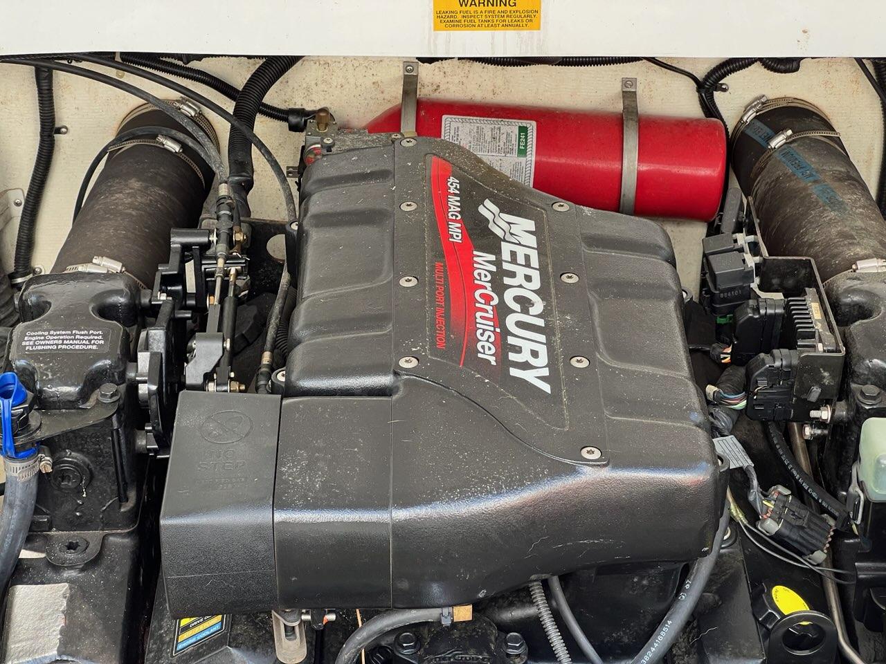 Slide: The Image of Mercury MerCruiser engine in a 2000 Baja H2X boat, showcasing detailed components. - 4