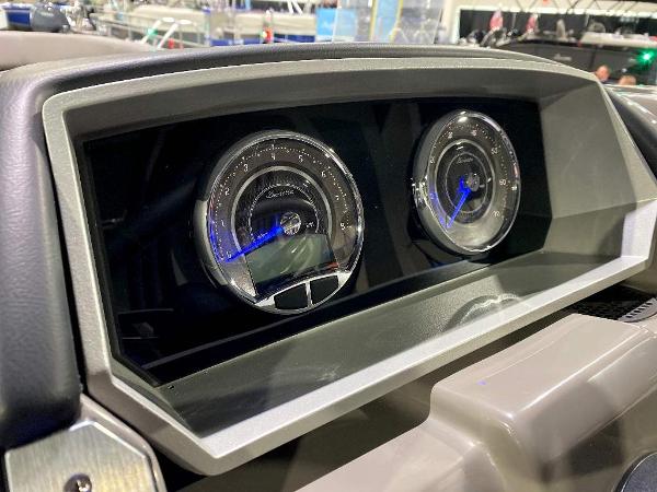 Slide: The Image of 2024 Barletta Corsa Ultra-Lounge 25UCA dashboard with dual analog gauges. - 22
