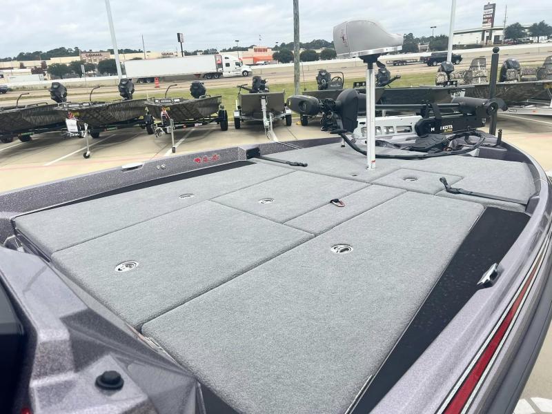 Slide: The Image of 2024 Bass Cat Caracal STS boat with spacious deck and advanced fishing equipment. - 10