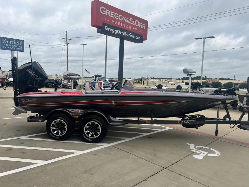 Slide: The Image of 2024 Bass Cat Caracal STS boat on trailer at Gregg Orr Marine & RV dealership. - 5