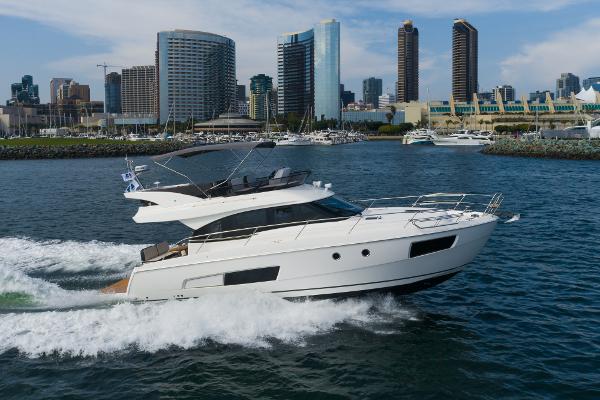 Slide: The Image of 2025 Bavaria Virtess 420 Fly yacht cruising near city skyline. - 12