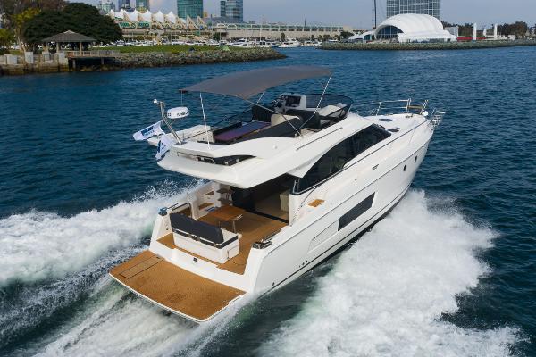 Slide: The Image of 2025 Bavaria Virtess 420 Fly yacht cruising on open water. - 16