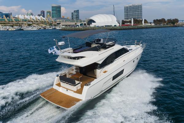 Slide: The Image of 2025 Bavaria Virtess 420 Fly yacht cruising near a city waterfront. - 17