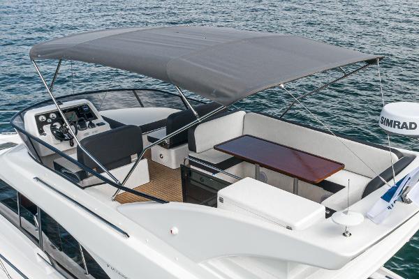 Slide: The Image of Bavaria Virtess 420 Fly 2025 yacht with flybridge, sleek design, and modern amenities. - 24