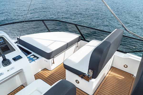 Slide: The Image of 2025 Bavaria Virtess 420 Fly yacht deck with seating and ocean view. - 27