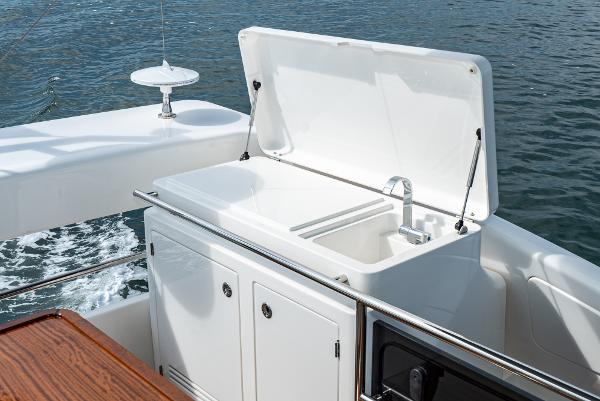 Slide: The Image of Bavaria Virtess 420 Fly 2025 yacht sink and storage on deck. - 29