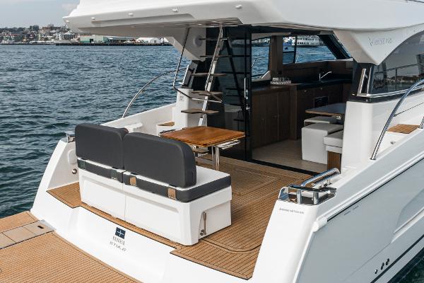 Slide: The Image of 2025 Bavaria Virtess 420 Fly yacht with elegant deck and seating area. - 31