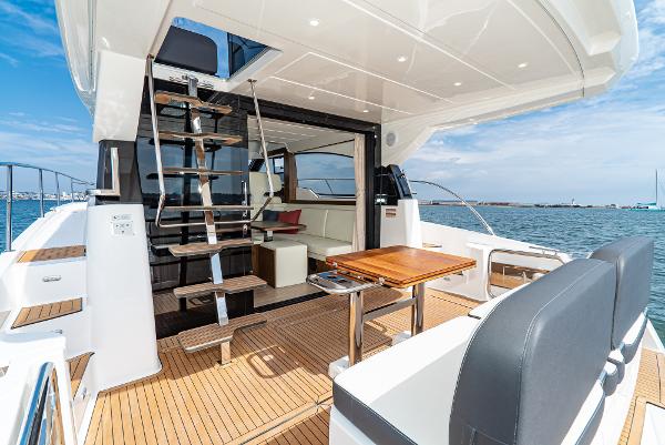 Slide: The Image of Luxurious Bavaria Virtess 420 Fly yacht interior, 2025 model, featuring elegant wood finishes and modern design. - 33