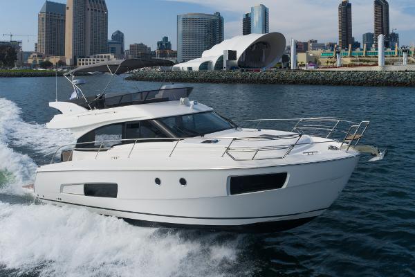 Slide: The Image of 2025 Bavaria Virtess 420 Fly yacht cruising near city skyline. - 6