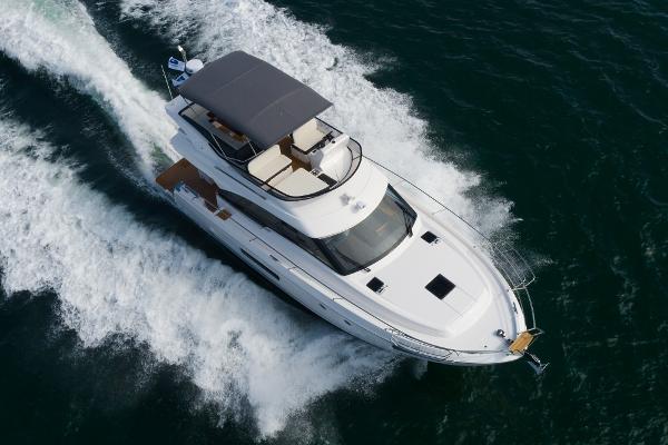 Slide: The Image of 2025 Bavaria Virtess 420 Fly yacht cruising on open water. - 9