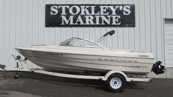 Slide: The Image of 2000 Bayliner 1950 Capri DX boat on trailer at Stokley's Marine. - 1